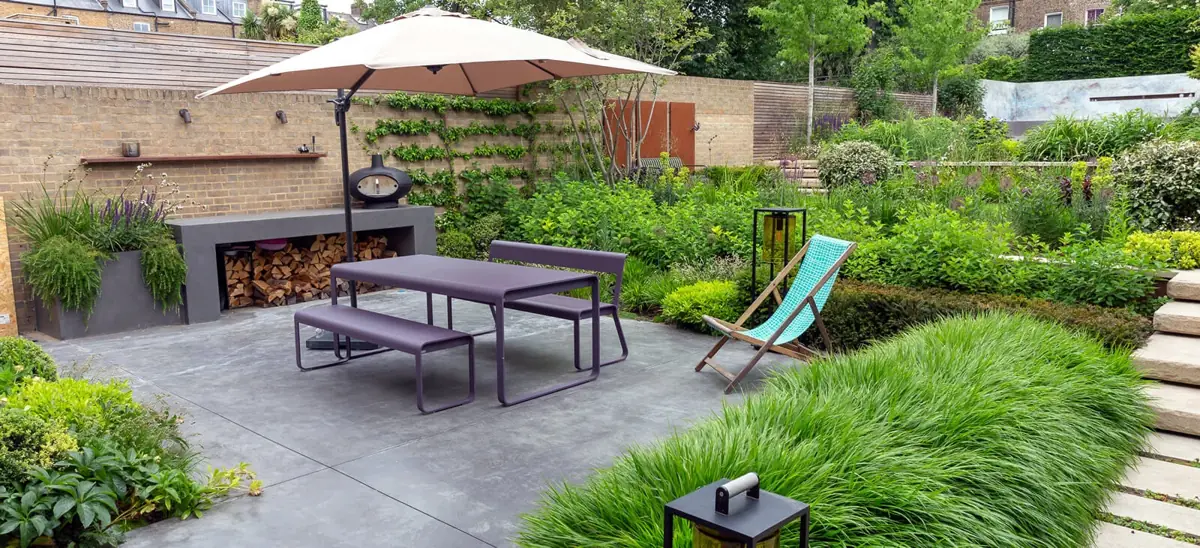 Clapham garden with a terrace, floating steps and generous planting