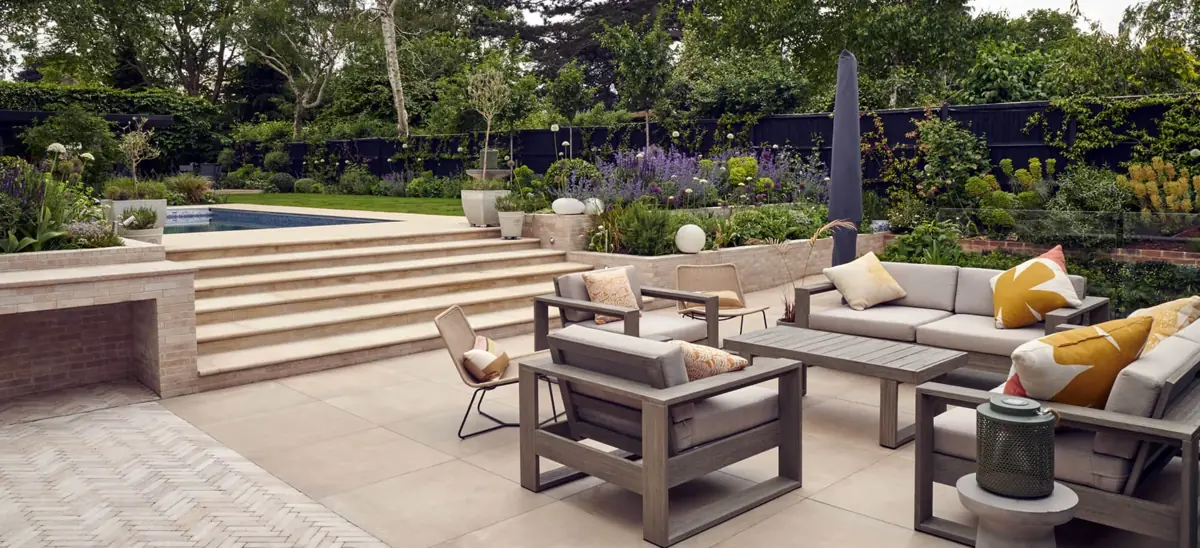 Wimbledon terrace, planting and steps leading towards the swimming pool